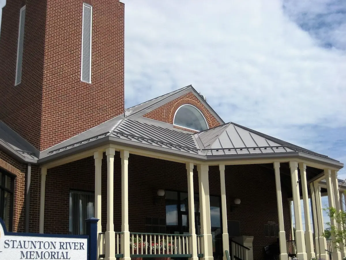 Skilled roofing craftsmen working on a residential roof in Kannapolis